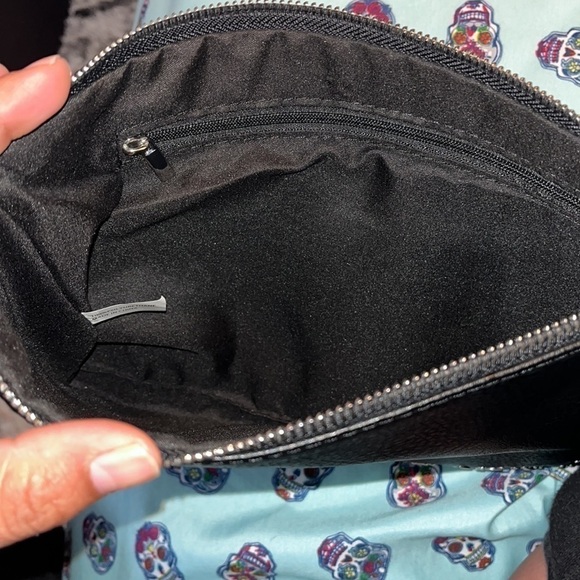 Unknown brand silver studded clutch in black with and attached strap. - Picture 4 of 4